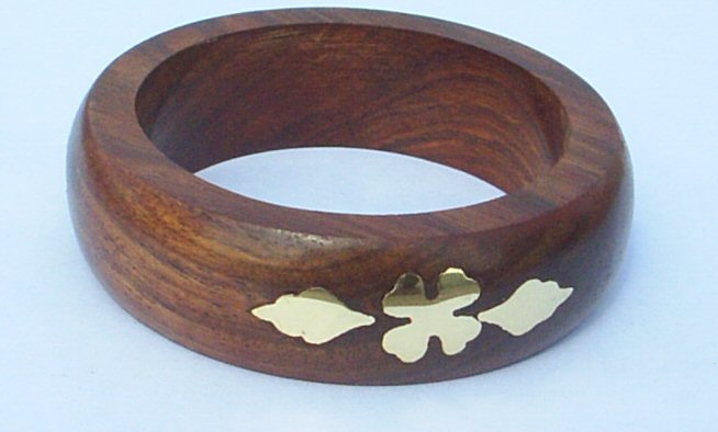 Wooden Bangle studded with  gold tone motifs